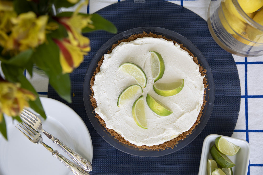 Ina Garten's Frozen Key Lime Pie with whipped cream and lime zest