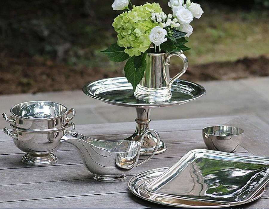Hôtel Silver serving pieces styled decoratively on a sideboard for everyday home elegance