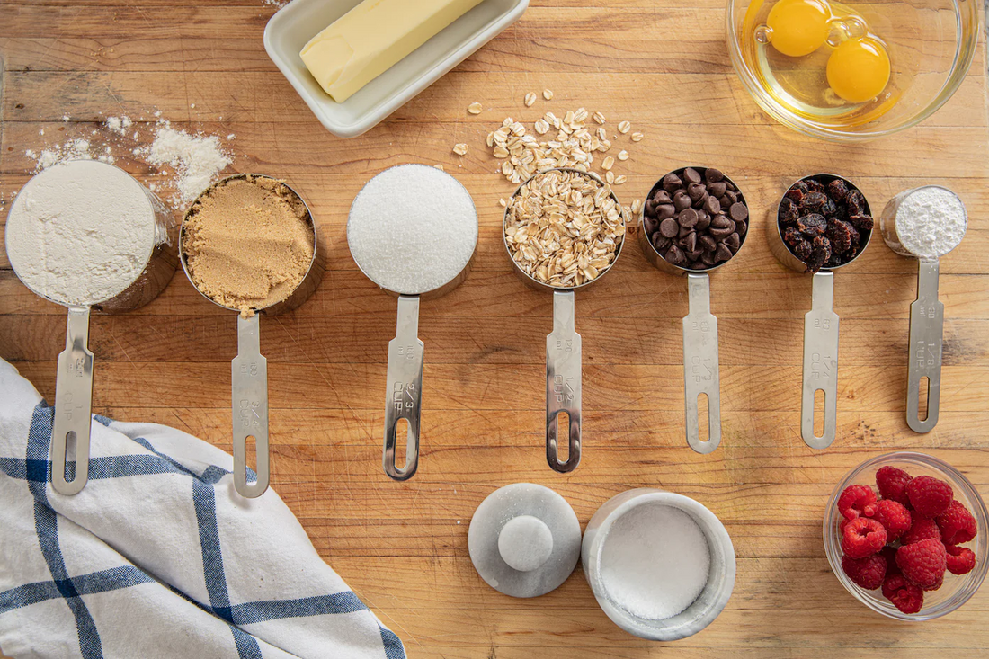 Fall baking essentials including sheet pans, mixing bowls, and seasonal spices from Cassandra's Kitchen