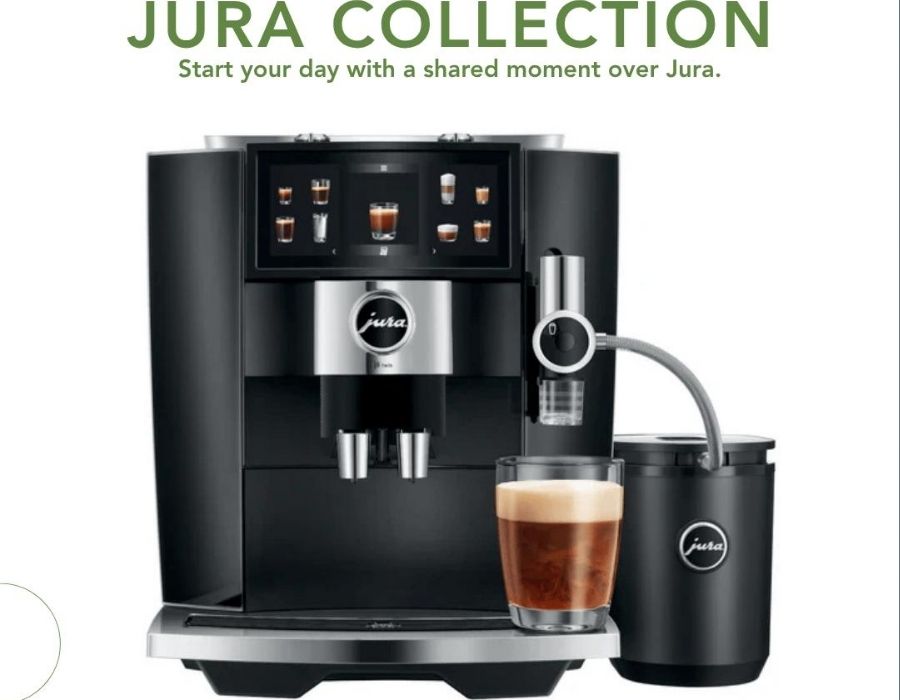 Jura automatic coffee maker brewing artisan coffee at home on a kitchen counter