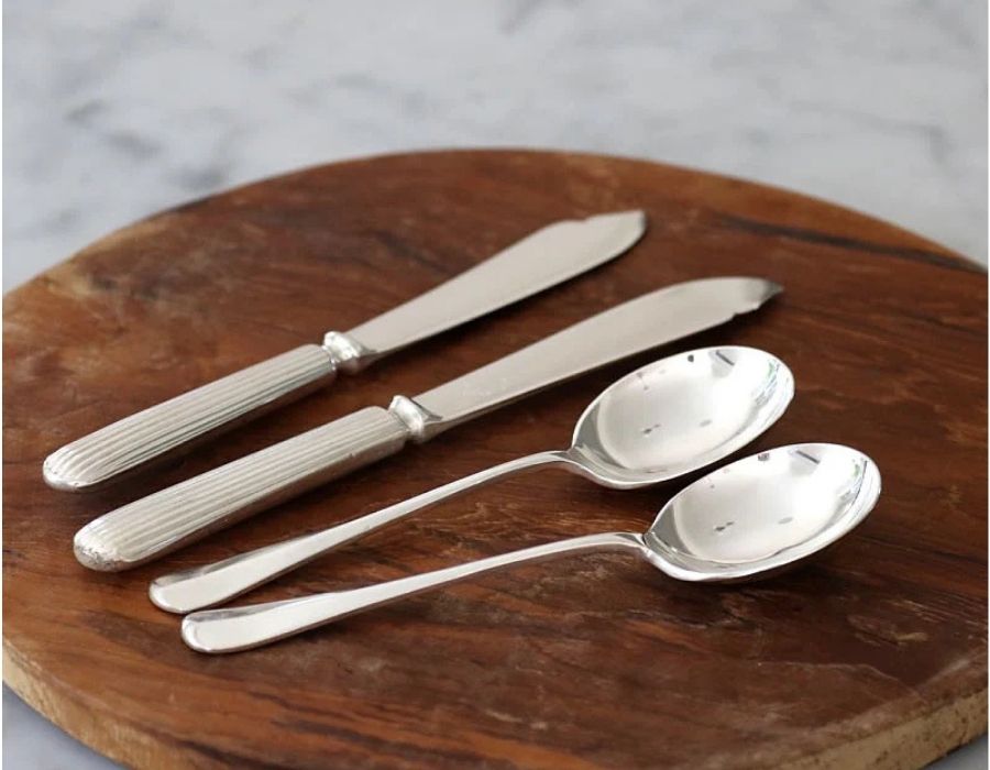 Hôtel Silver pieces being polished and cared for with expert cleaning techniques