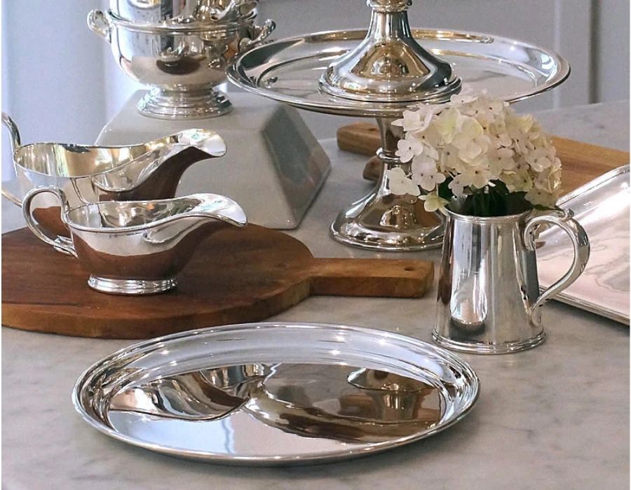 Hôtel Silver vintage silverware collection including serving bowls, platters, and gravy boats