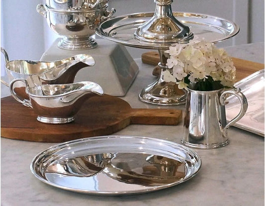 Hôtel Silver vintage silverware collection including serving bowls, platters, and gravy boats