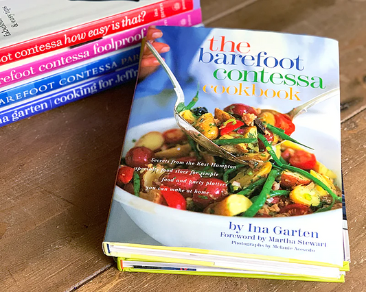Ina Garten Barefoot Contessa cookbooks stacked on a kitchen counter, five reasons to try them