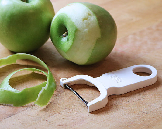 Essential kitchen tools trusted by Ina Garten including sheet pans, Dutch oven, and chef's knife