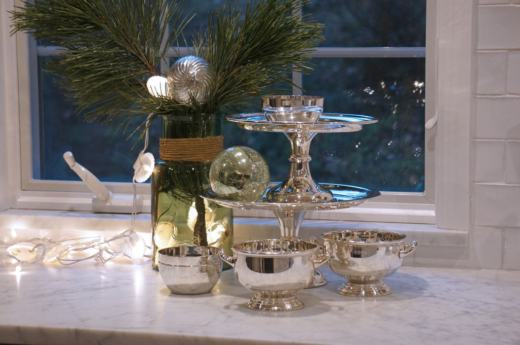 Ina Garten’s favorite vintage HÔTEL Silver displayed on kitchen counter with plant and lights