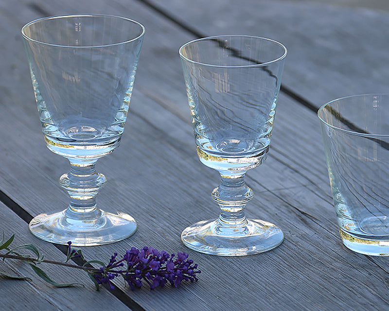 La Rochere Antoine Wine Glasses and water glasses on wooden table