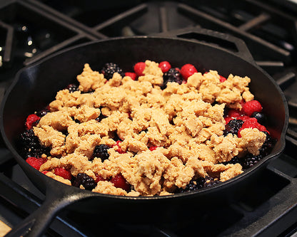 12-Inch Cast Iron Skillet filled with Berries while prepping a Skillet Berry Cobbler
