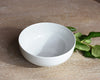 White Pillivuyt Cereal Bowl next to greenery