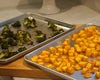 Ina Garten recommended Professional Half Sheet Pans cooking broccoli and potatoes.