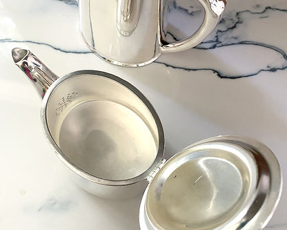 The inside of the Vintage HÔTEL Silver Teapot is in pristine condition.
