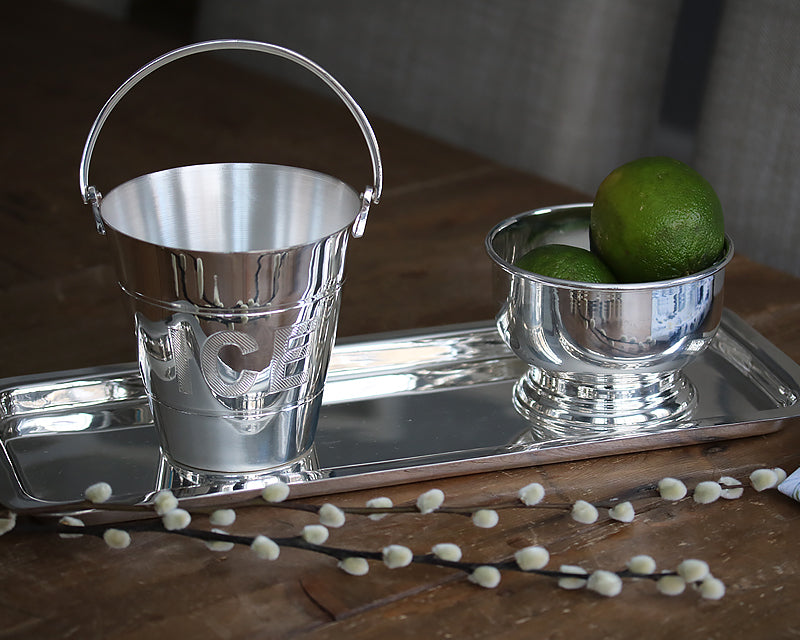 HÔTEL Silver Pedestal Bowl and silver ice pail on an oblong bar tray