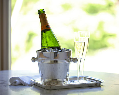 Silver Wine Bottle Chiller from the Hôtel Private Label Collection on top of a HÔTEL Silver bar tray