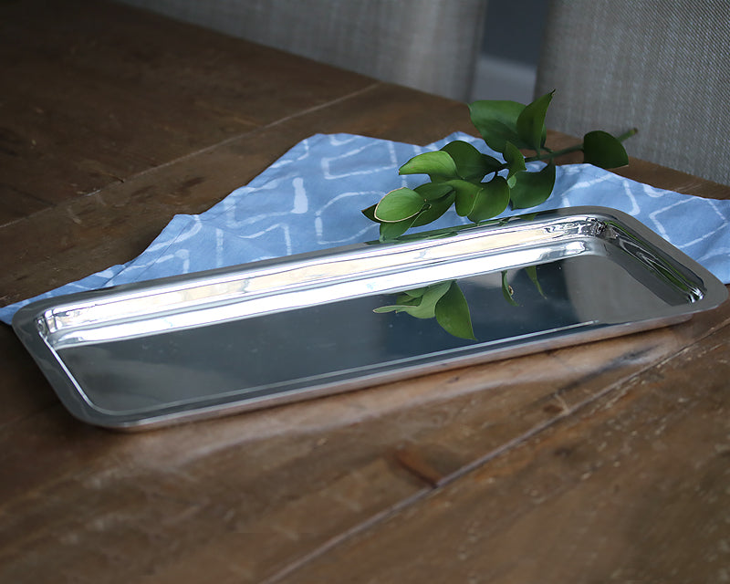 HÔTEL Silver Oblong Bar Tray on wooden table