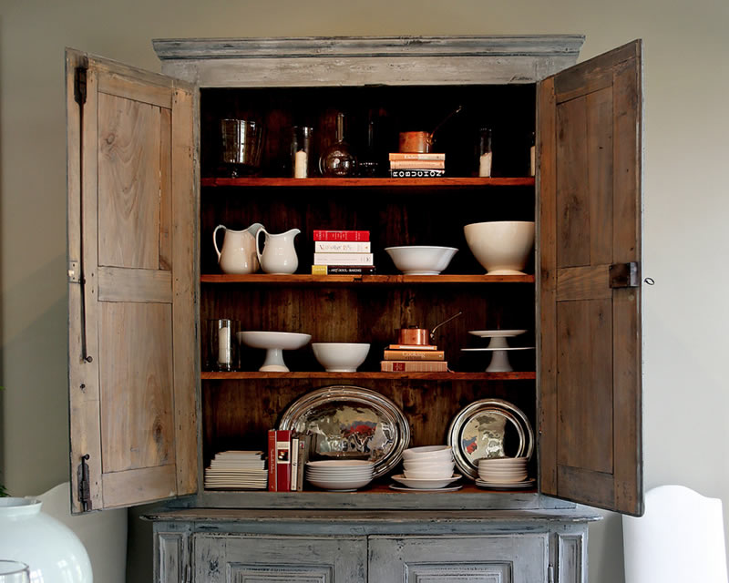 Ina Garten's kitchen cabinet displaying items from the HÔTEL Silver collection