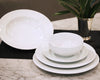 White dinnerware including 3 plates and 2 bowls stacked